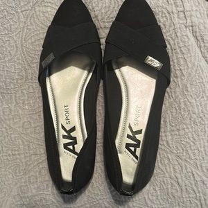 Never worn Anne Klein flats.